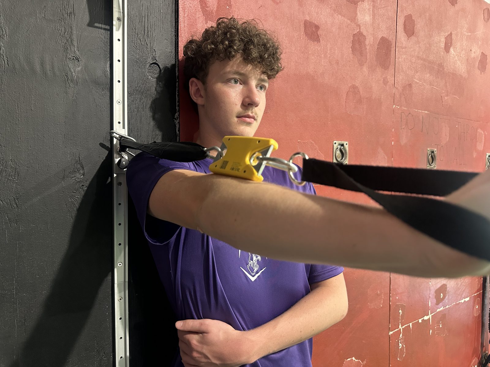 Athlete testing shoulder external rotation with ForceIQ